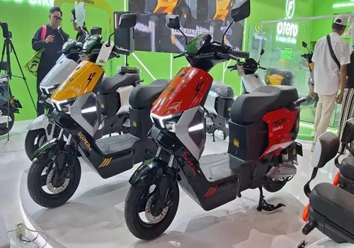 a group of motorcycles in a room